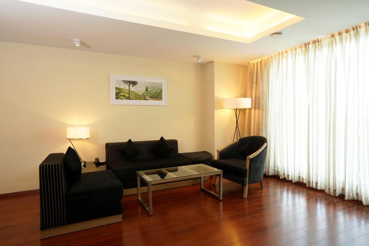 O By Tamara, Trivandrum Thiruvananthapuram Extérieur photo A living room