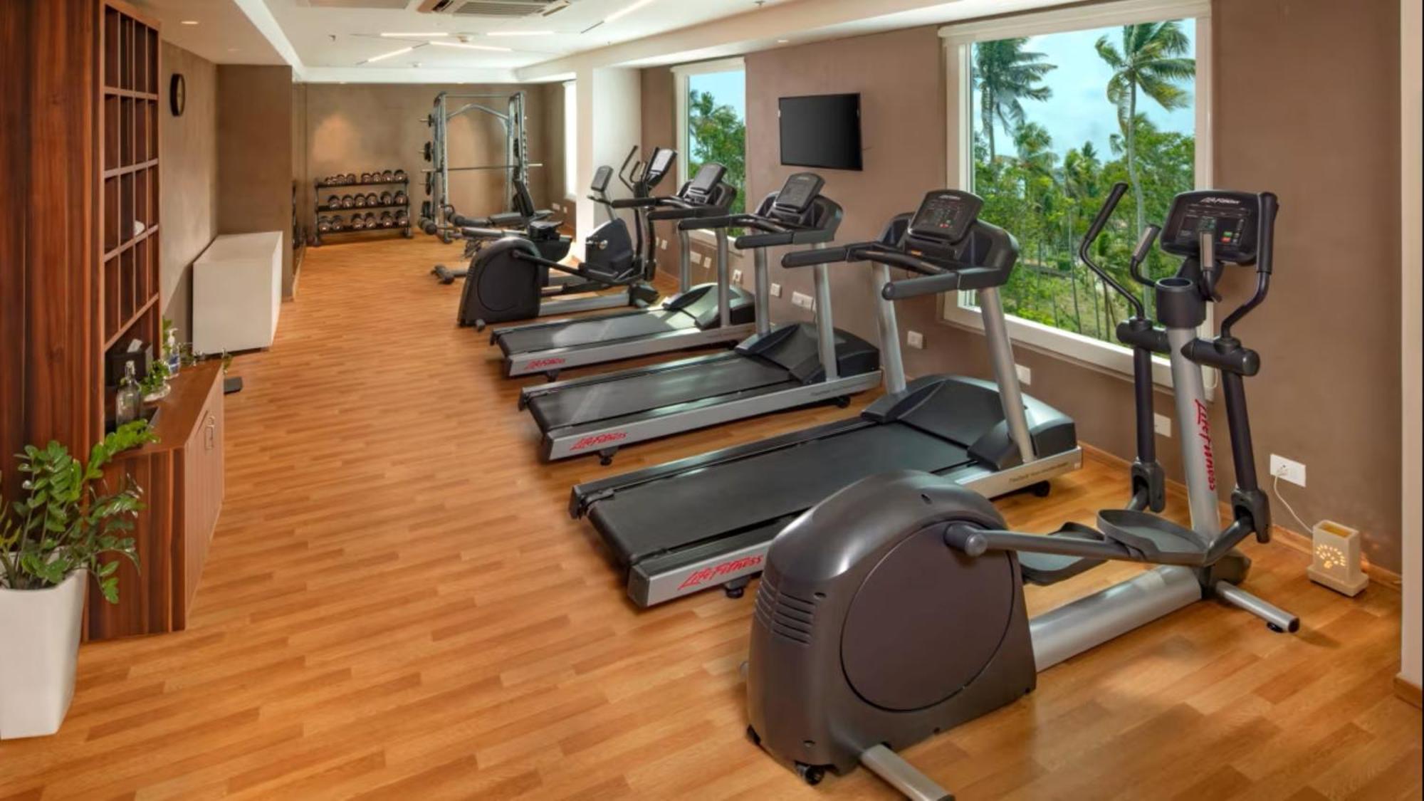 O By Tamara, Trivandrum Thiruvananthapuram Extérieur photo The gym at the hotel